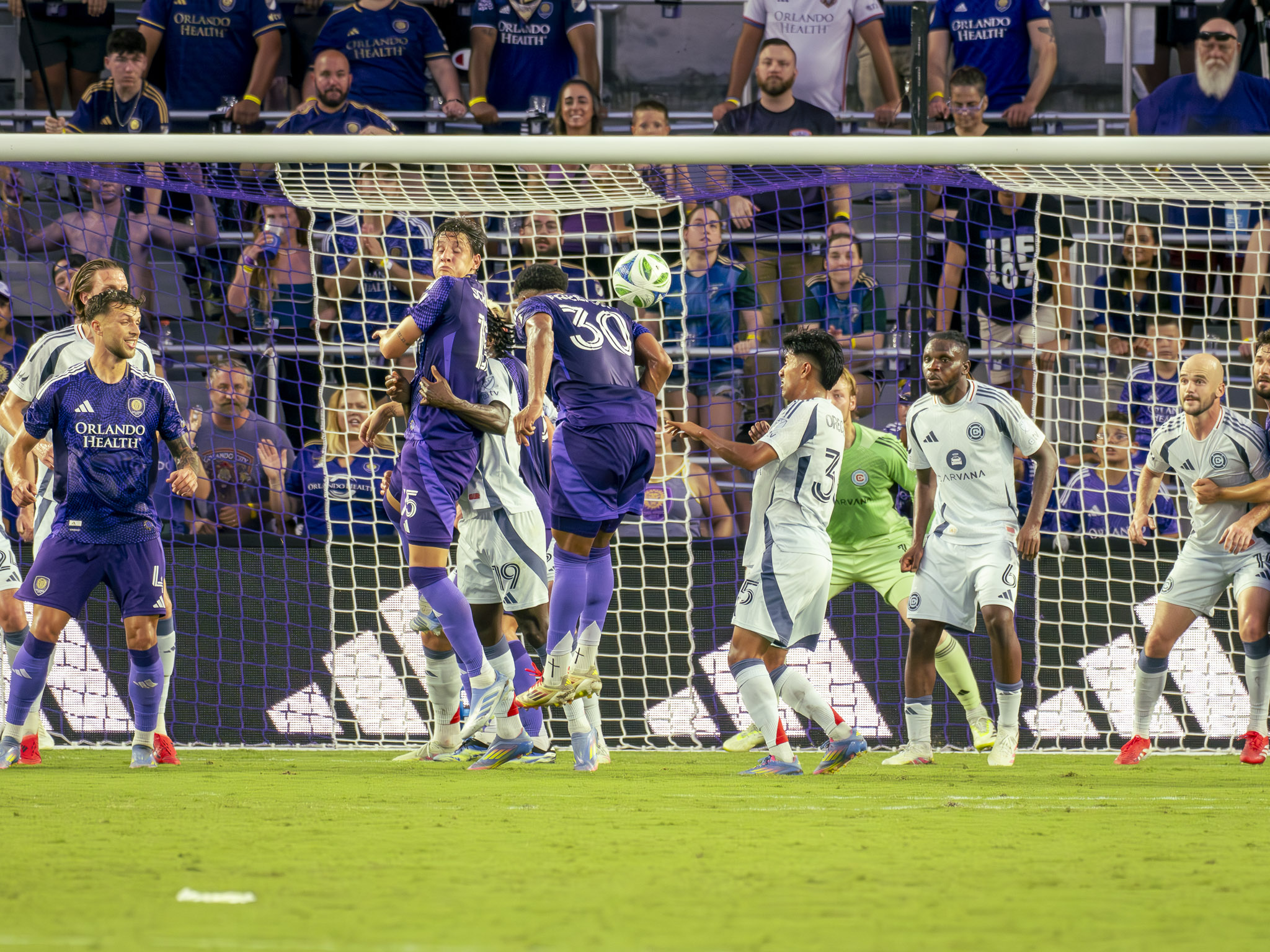 Alex Freeman scores on a header. Photo by Mario Casamalhuapa