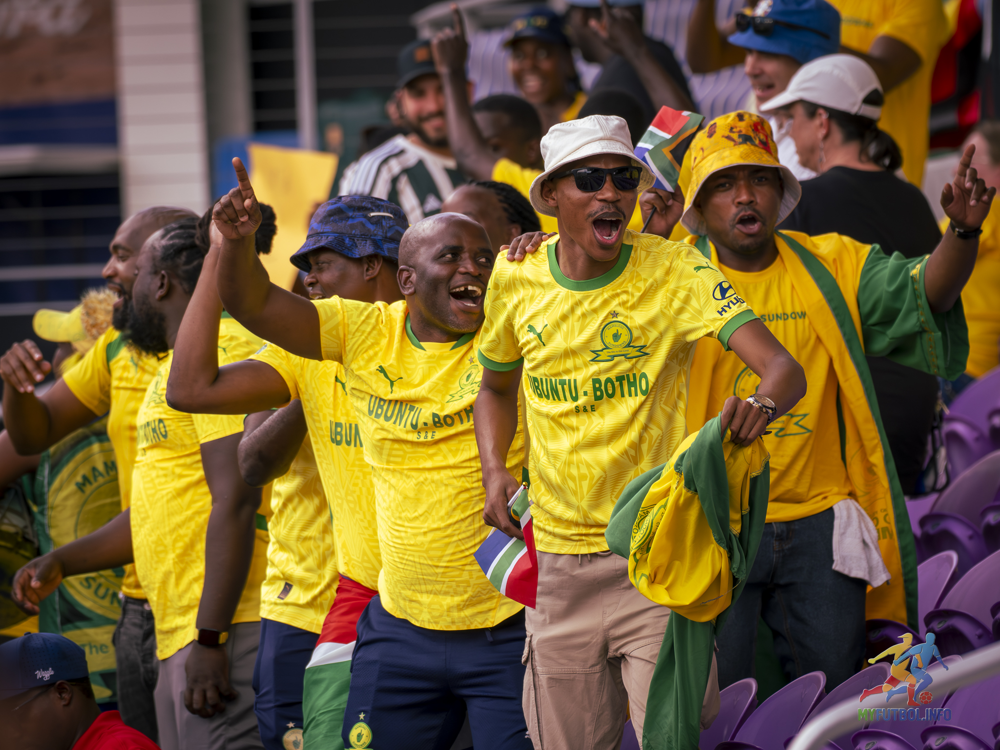 Mamelodi Sundowns fans dancing and bringing joy to the stadium. Photo by Mario Casamalhuapa