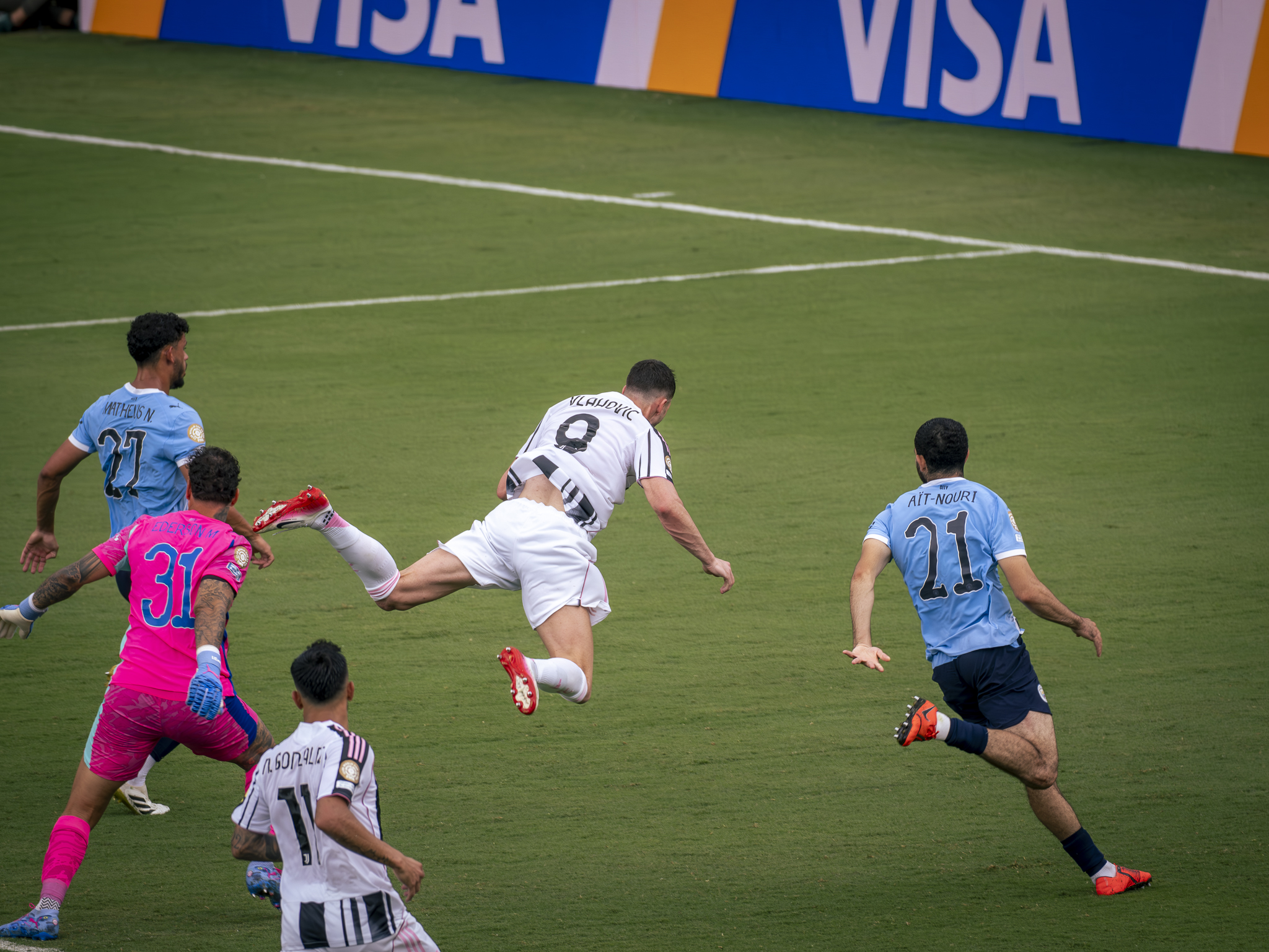 Dusan Vlahovic goes flying trying to score a second goal