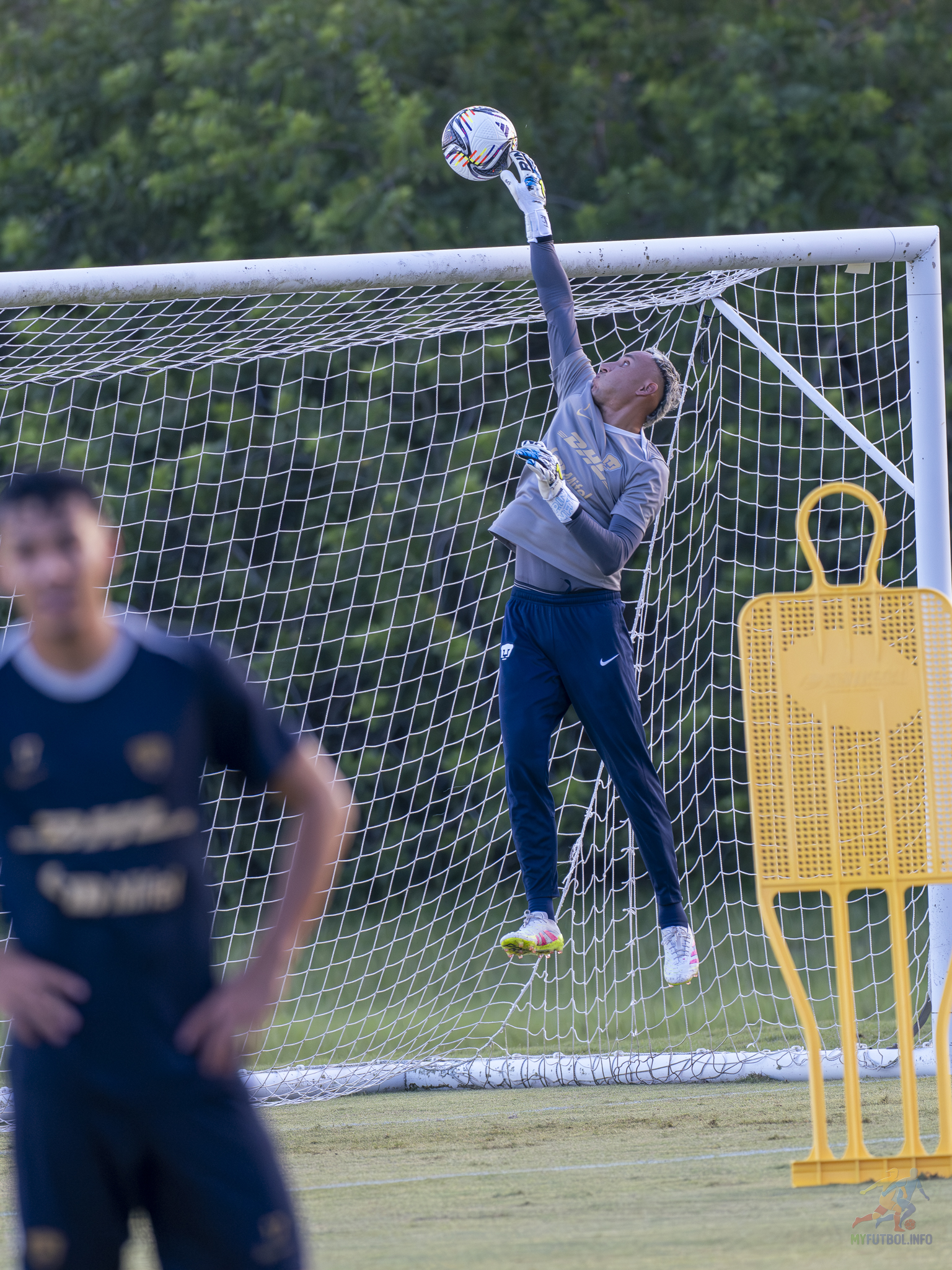 38 year old keeper Keylor Navas taps the ball over the goal.