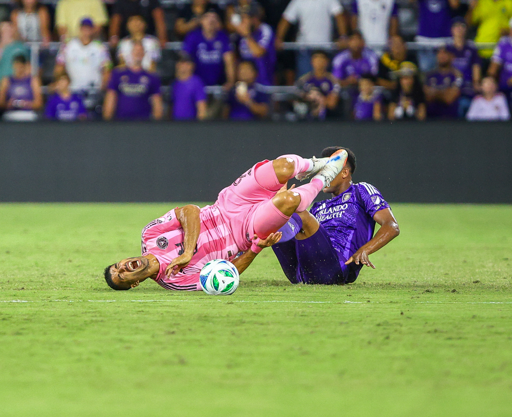 Luis Suarez is fouled by Alex Freeman.